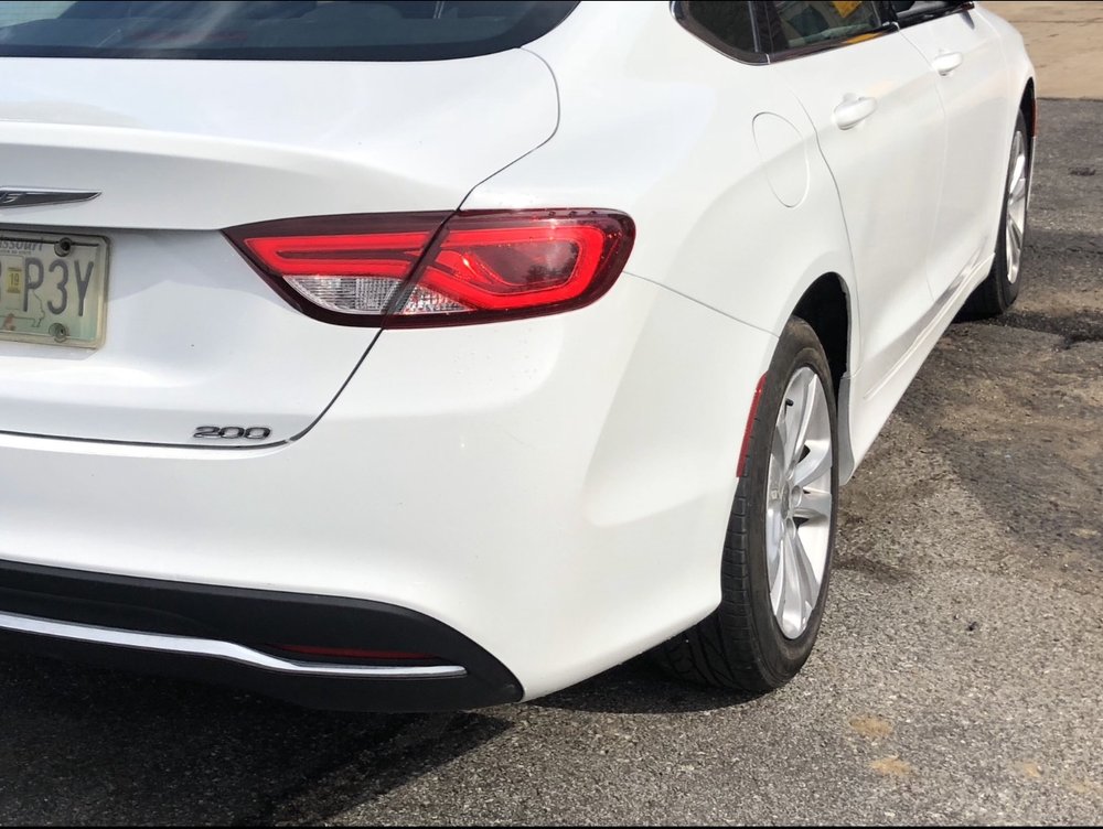 Repaired sedan with factory-matched finish
